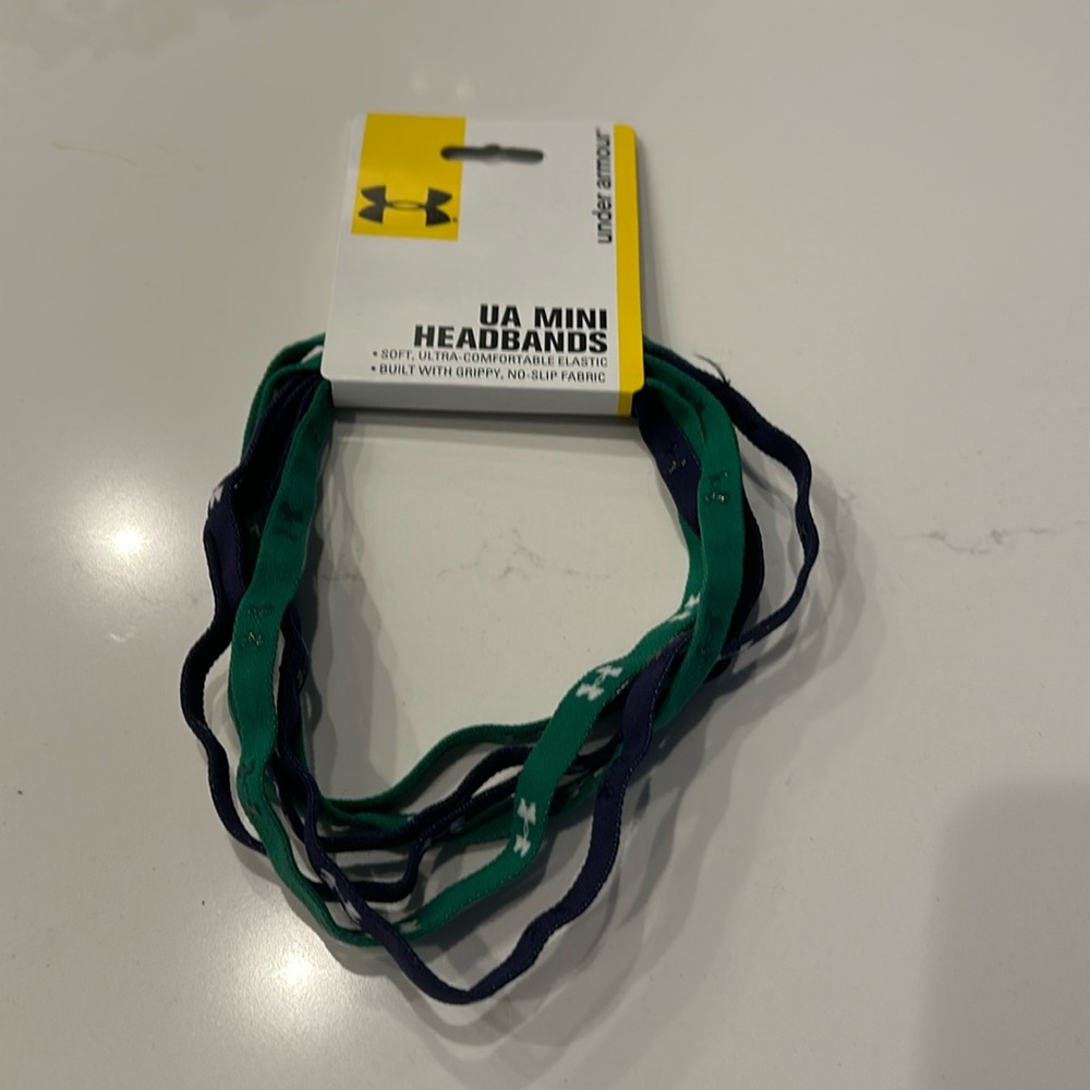 NWT- Under Armour 6 pack blue and green with white branding Headbands.
